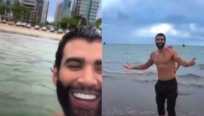 Gusttavo Lima toma banho de mar em Maceió e brinca: 'tirar inveja'